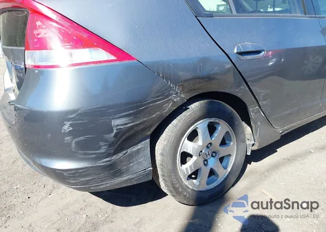 2011 Honda Insight Ex from USA, damaged, VIN JHMZE2H70BS008210